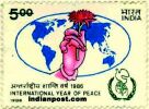 HAND HOLDING FLOWER WORLD MAP 1202 Indian Post